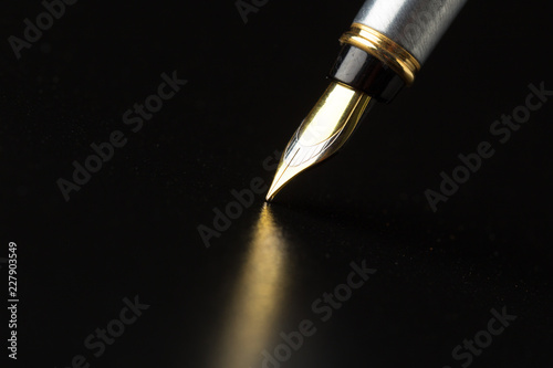 Fountain pen with clipping path on black background