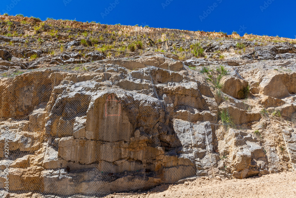Fototapeta premium Metal netting protecting from rock fall
