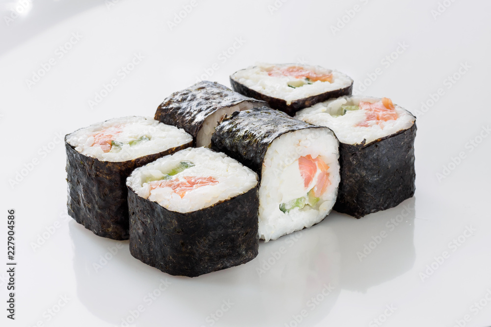 Japanes seafood sushi rolls isolated on white background. Japanes seafood sushi rolls isolated on white background.