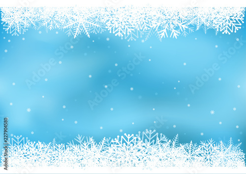 Blue snowflake background. Snow sky frame. Frosty close-up wintry snowflakes. Ice shape pattern template. Christmas holiday decoration backdrop