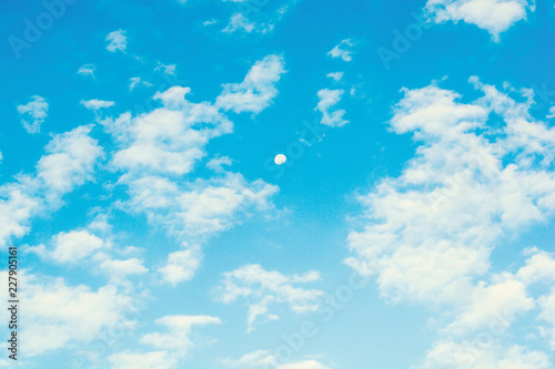 Fototapeta Naklejka Na Ścianę i Meble -  sky blue clouds background with moon