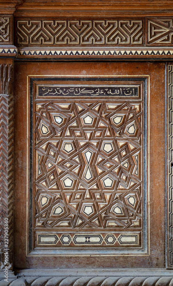 Single arabesque sash of an old mamluk era cupboard with geometrical decorations, Zeinab Khatoon historic house, Cairo, Egypt Single arabesque sash of an old mamluk era cupboard with geometrical decorations, Zeinab Khatoon historic house, Cairo, Egypt
