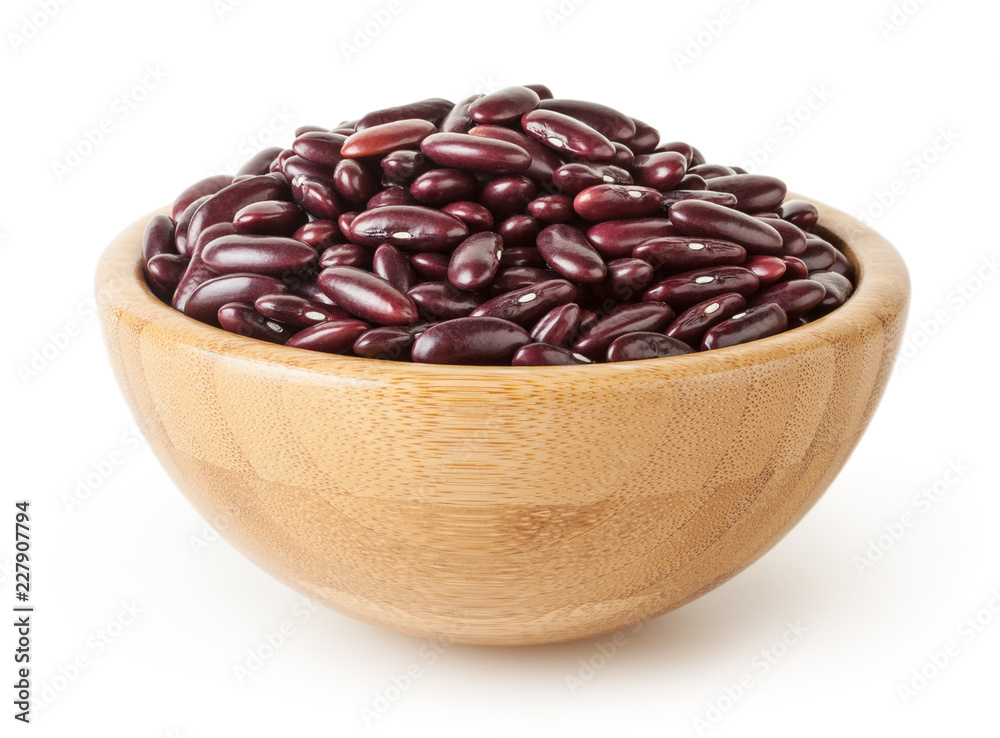 Uncooked red kidney beans in wooden bowl isolated on white background with clipping path Uncooked red kidney beans in wooden bowl isolated on white background with clipping path