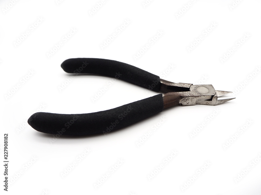 A cutting pliers for model kit isolated on white background. A cutting pliers for model kit isolated on white background.