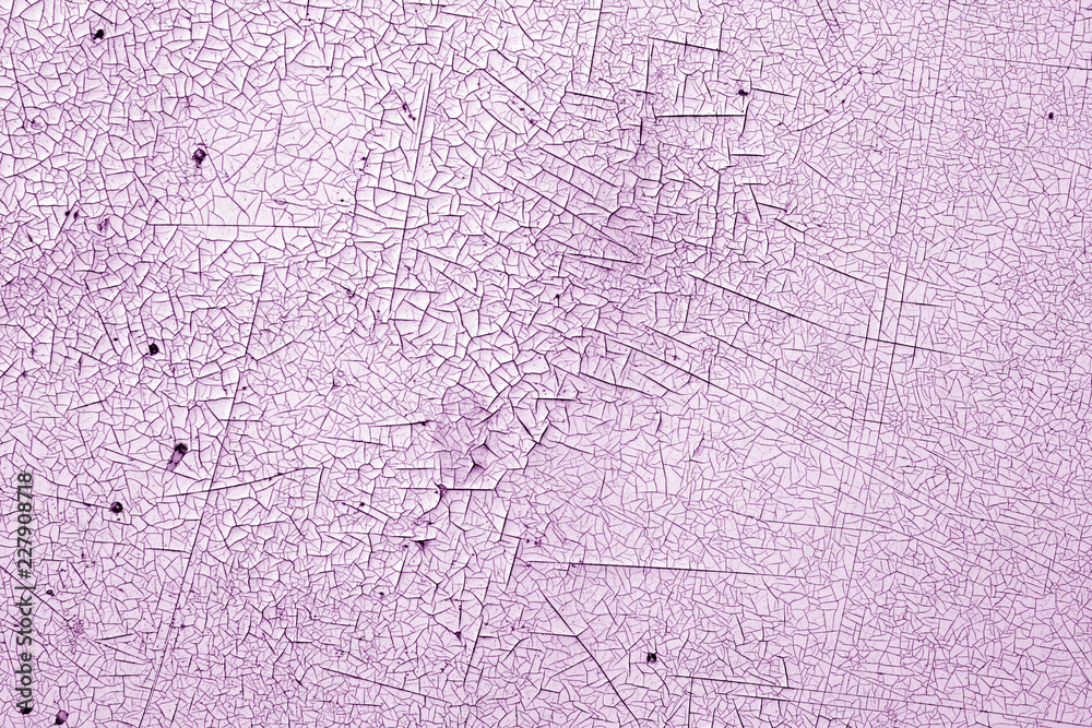 Crack and damage on painted texture in purple tone. Crack and damage on painted texture in purple tone.