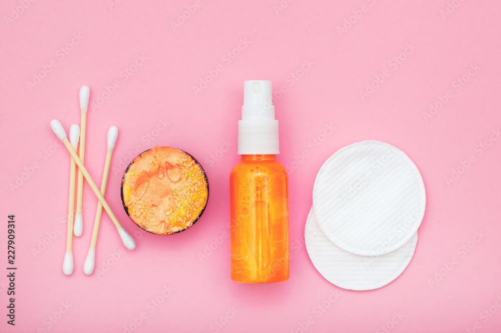Cosmetic products on pink background Cosmetic products on pink background