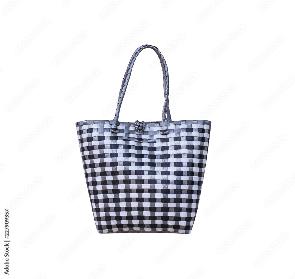 White and black plastic woven bag patterns with handle isolated on white background White and black plastic woven bag patterns with handle isolated on white background