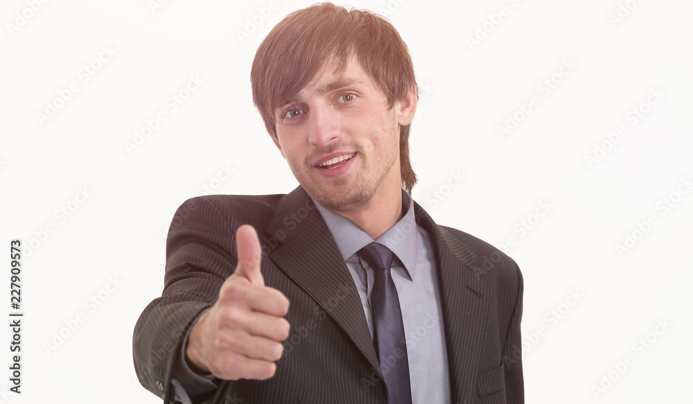 young businessman showing thumb up young businessman showing thumb up