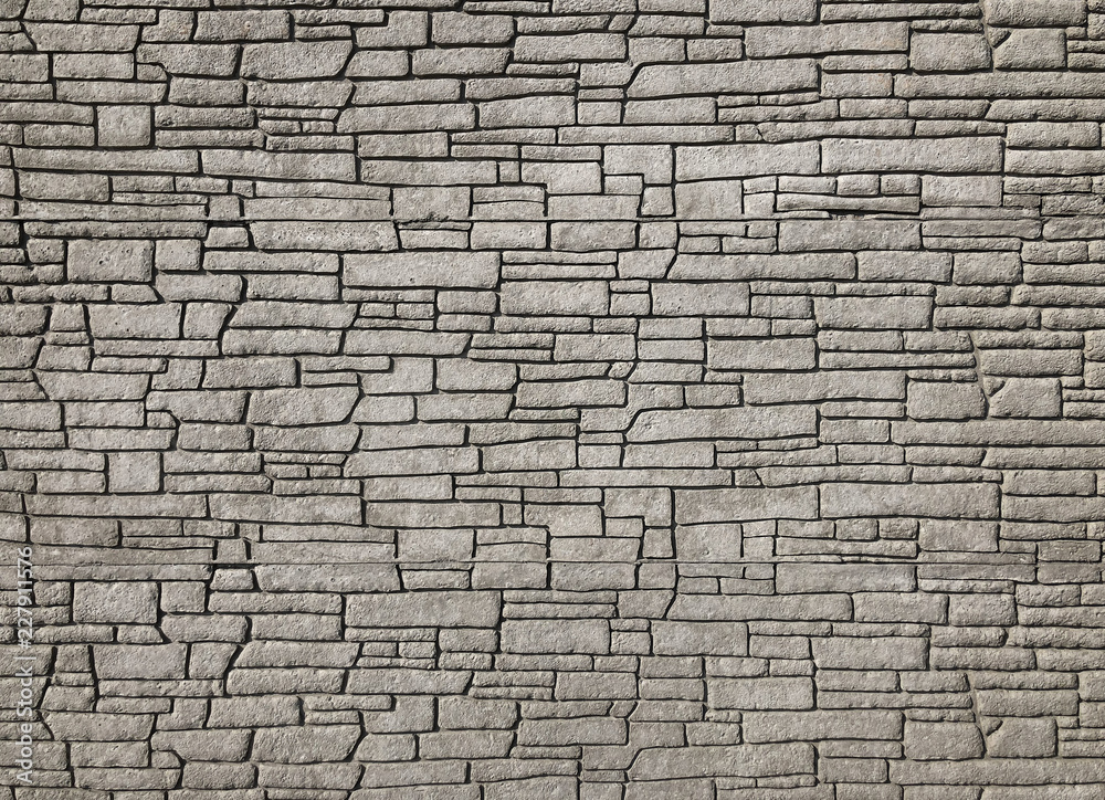 Obraz premium Steinwand Ziegel Steinriemchen Fassade Mauer Hintergrund