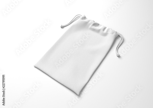 Drawstring bag on background. Fabric cotton small bag. Isolated pouch.