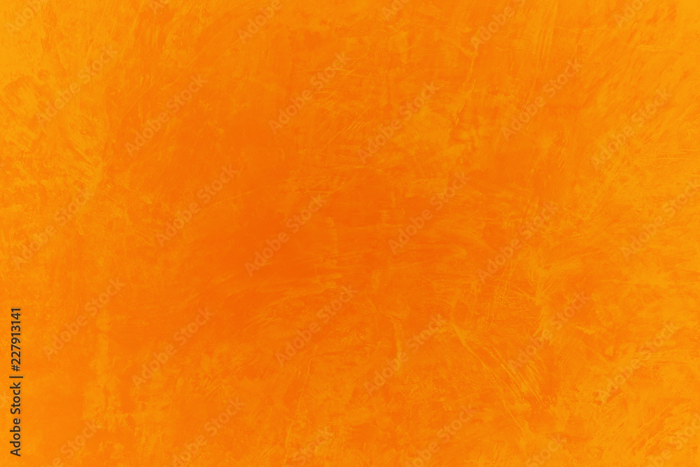 Naklejka premium Orange cardboard texture for background. Halloween and decoration concept