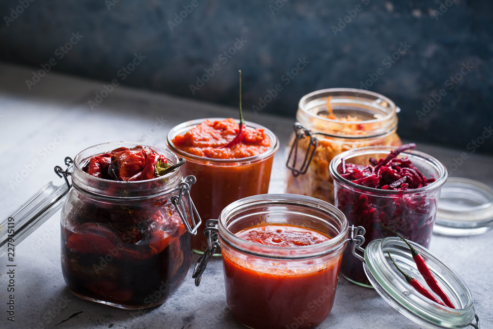 Fermented preserved jars red cabbage, beetroot, tomato sauce, red peppers fried Canning jar food Fermented preserved jars red cabbage, beetroot, tomato sauce, red peppers fried Canning jar food