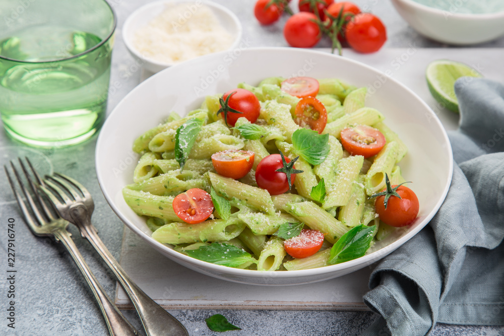 penne pasta with creamy avocado sauce and tomatoes penne pasta with creamy avocado sauce and tomatoes