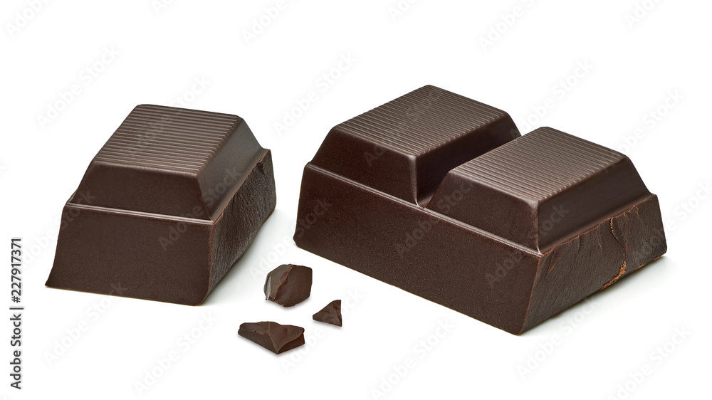 Broken chocolate bars and pieces isolated on white background