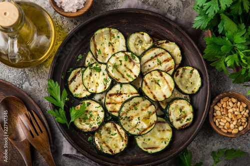 grilled zucchini on plate photo