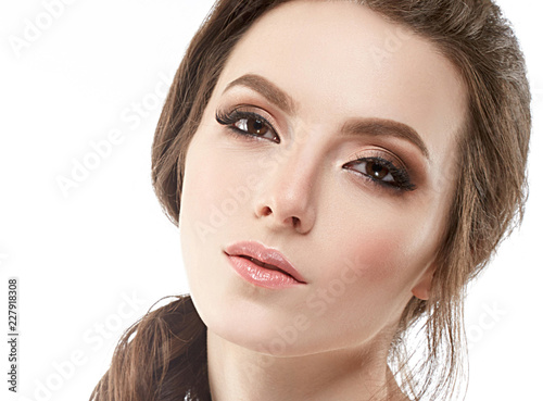 Beautiful brunette woman healthy skin beautiful makeup and eyes isolated on white cosmetic concept hair