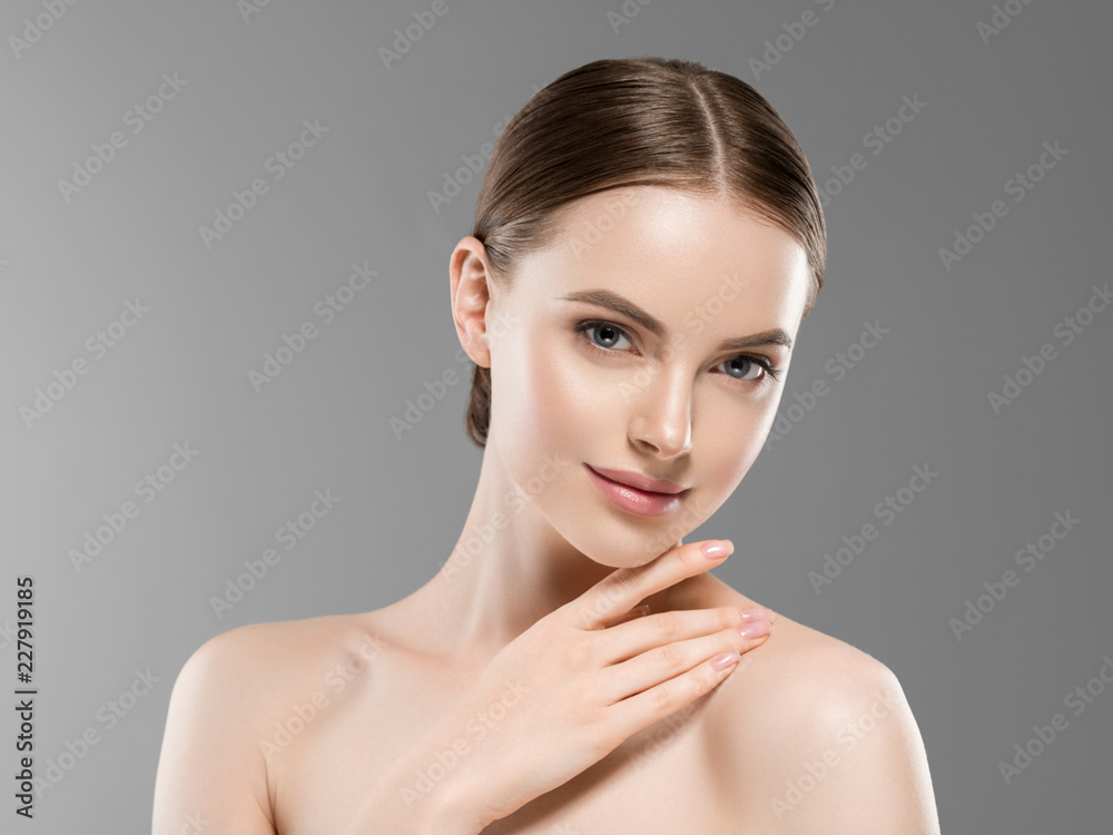 Healthy skin face brunette woman closeup face beautiful eyes cosmetic concept young model over gray background Healthy skin face brunette woman closeup face beautiful eyes cosmetic concept young model over gray background