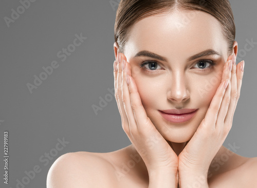 Healthy skin face brunette woman closeup face beautiful eyes cosmetic concept young model over gray background