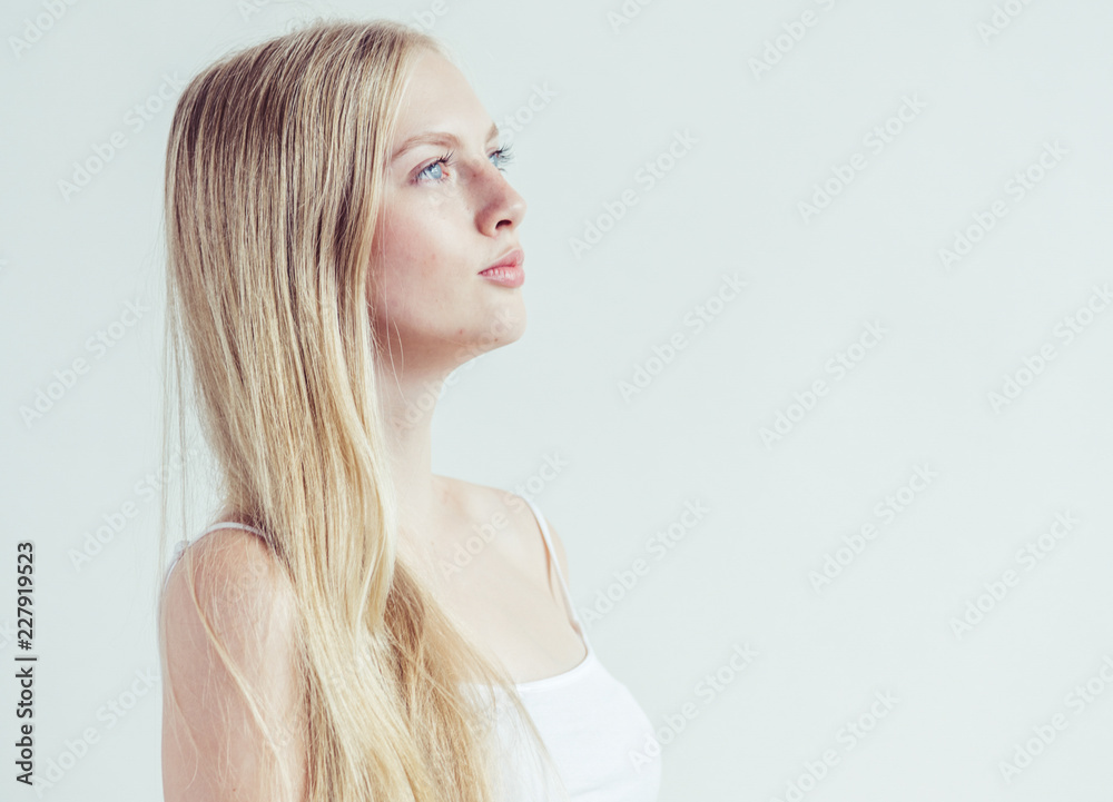Naklejka premium Natural makeup healthy skin and hair blonde woman beauty face portrait