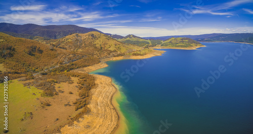 Aerial panorama of Blowering reservoir lake and mountains in NSW, Australia