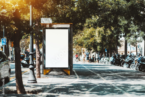 Photography Empty billboard placeholder template on the city bus stop with the sidewalk on t