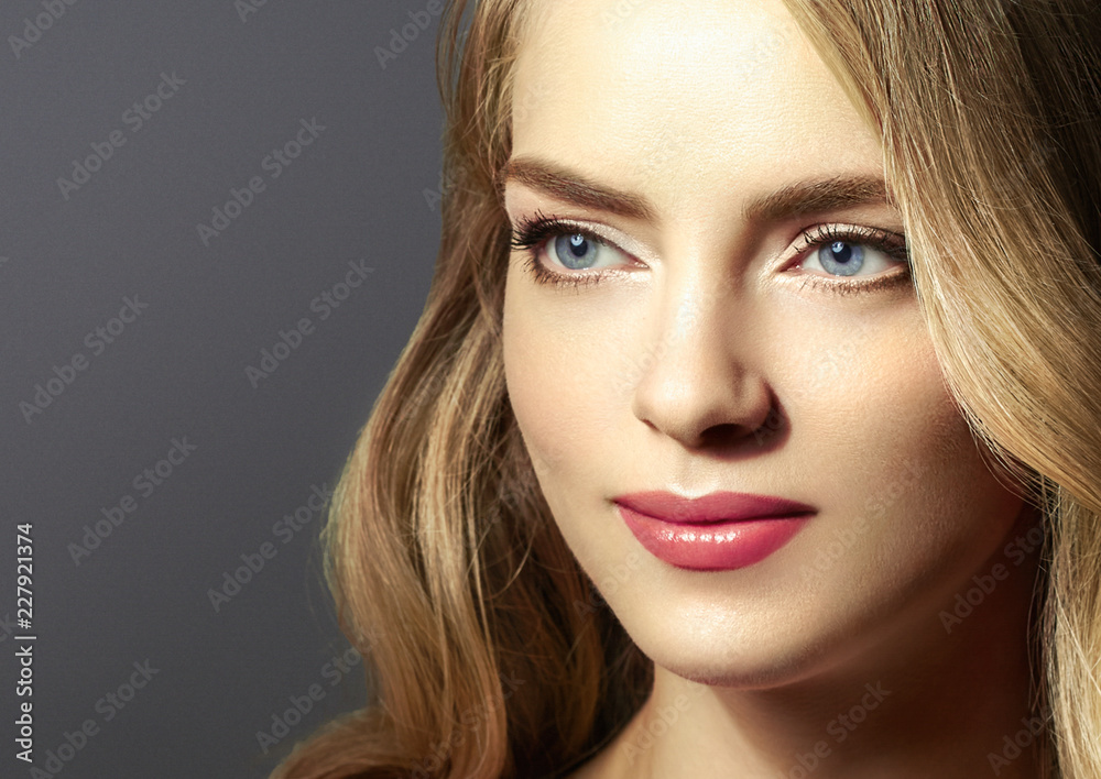 Beautiful blonde girl portrait, woman face with perfect long hairstyle. Beautiful blonde girl portrait, woman face with perfect long hairstyle.