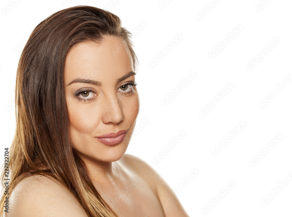 Portrait of beautiful shirtless woman on white background Portrait of beautiful shirtless woman on white background