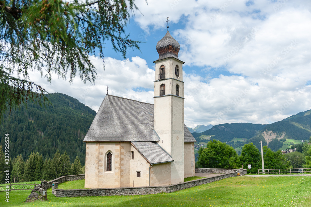 The Church of the village of Santa Fosca in the Italian Dolomites