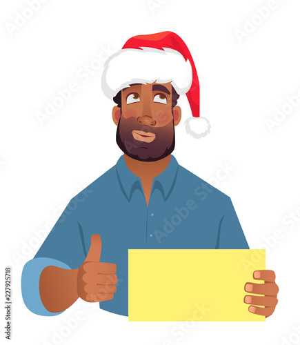 African man in hat holding blank card