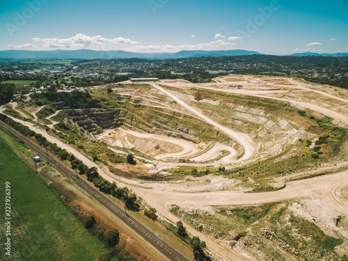 Aerial view of big limestone mine and mountains in Australia
