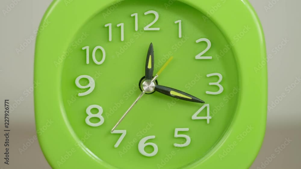 Green clock beating time fastly. Deadline, time- timelapse Green clock beating time fastly. Deadline, time- timelapse