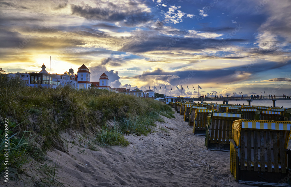 Sandy beach and traditional wooden beach chairs on Binz of the island Rugen, Northern Germany, on the coast of Baltic Sea