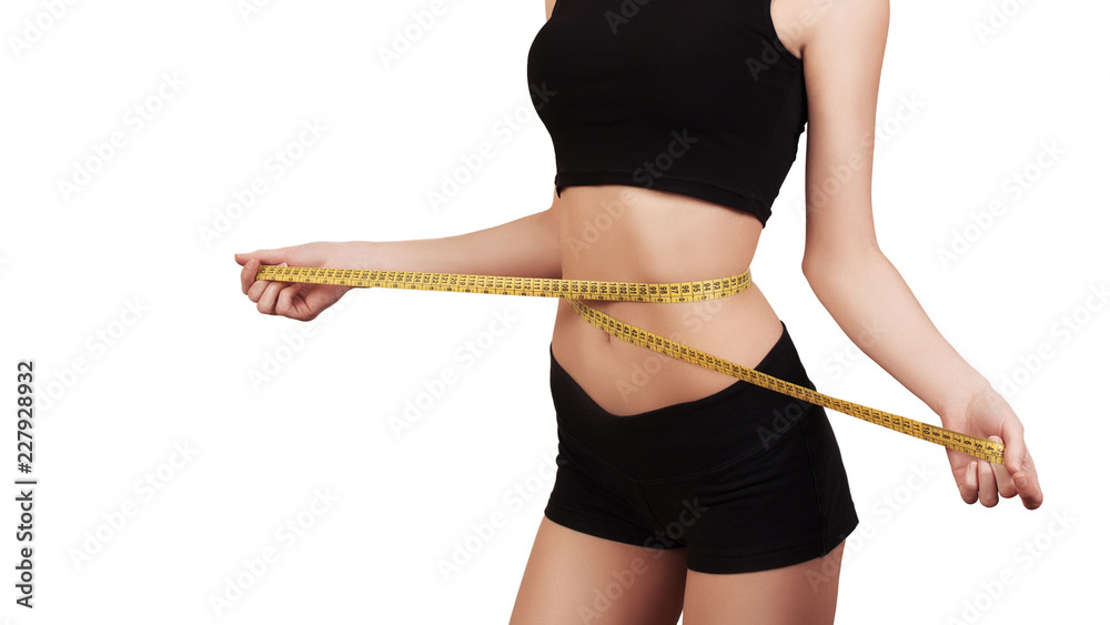 Fitness woman fit girl with measure tape measuring her waist Stock Photo by  ©Voyagerix 45796869