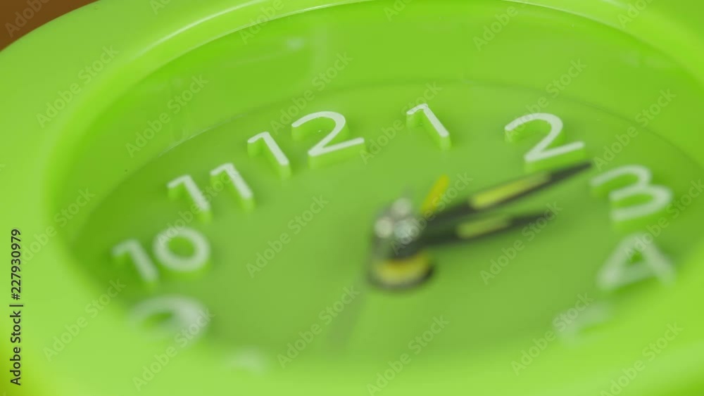 Green modern clock running fast- timelapse Green modern clock running fast- timelapse