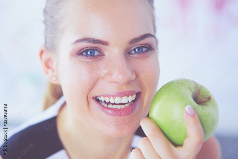 Close up portrait of healthy smiling woman with green apple. Close up portrait of healthy smiling woman with green apple.