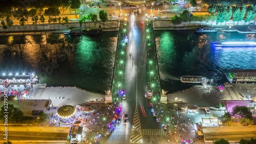 Aerial view on Jena Bridge (Pont d'Iena) at night, Seine river,Paris, France Bridge connects the Eiffel Tower on the left bank to the district of Trocadero on the right bank. photo