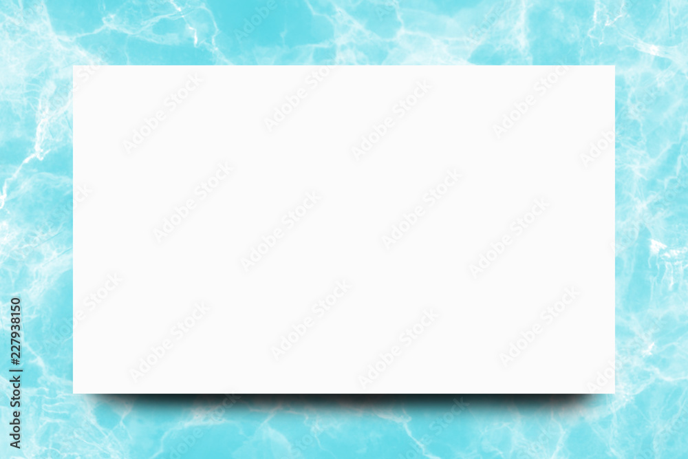 Empty white paper sheet on Turquoise marble background,Mock up for design.