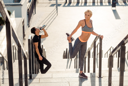 Couple preparing for running session