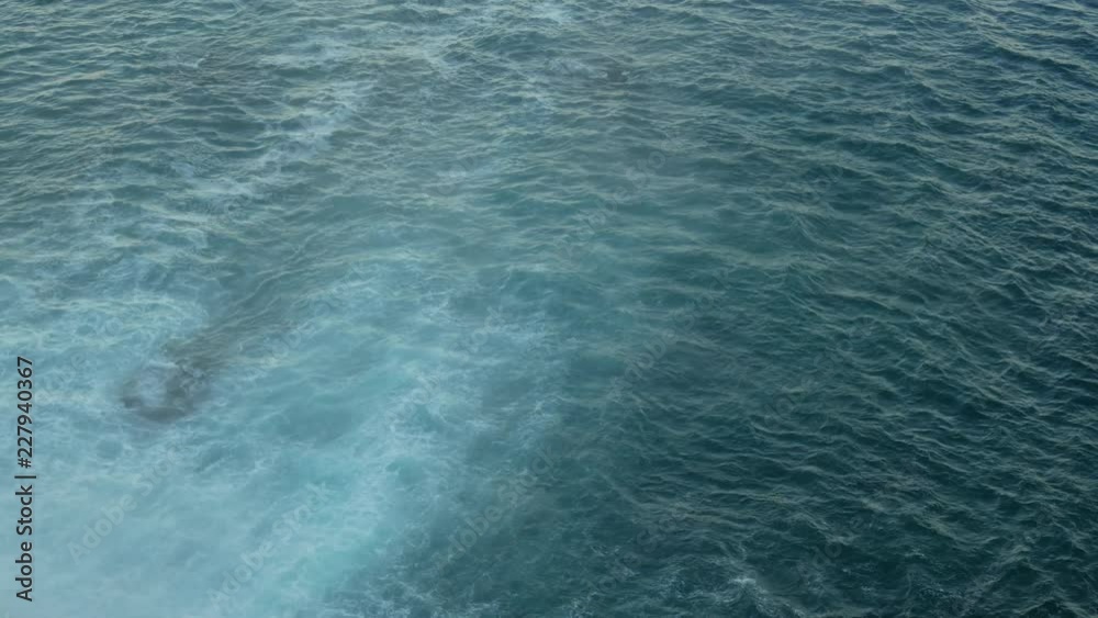Deep blue sea with tide. Top view. Minilamistic Deep blue sea with tide. Top view. Minilamistic
