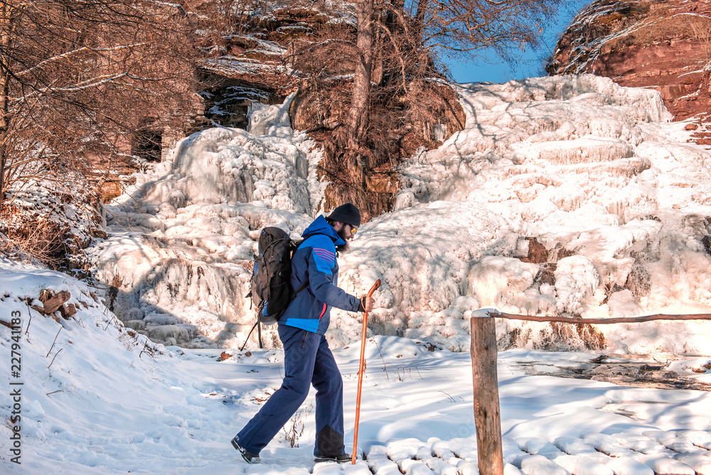 Man enjoying the winter landscape Man enjoying the winter landscape