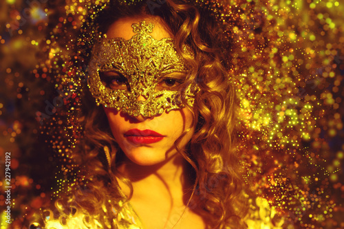 Fototapeta Naklejka Na Ścianę i Meble -  dancing woman with gold mask