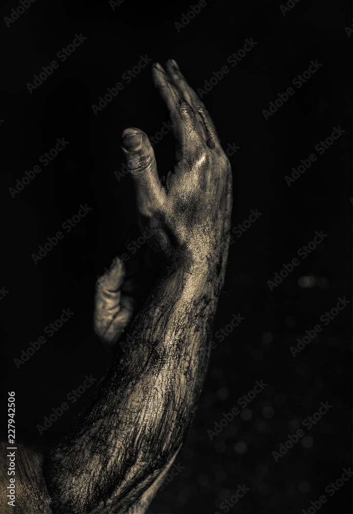 Close-up of a mans arm. Low key shoot