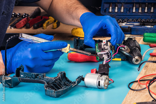 repair of power tools in the service center photo