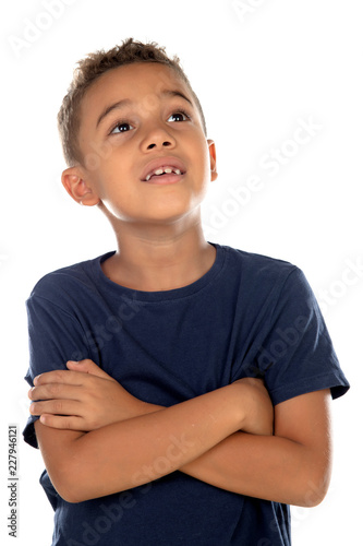 Pensive small child with blue t-shirt