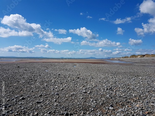 Beach landscape scene in Talybont, North Wales on a summer day.