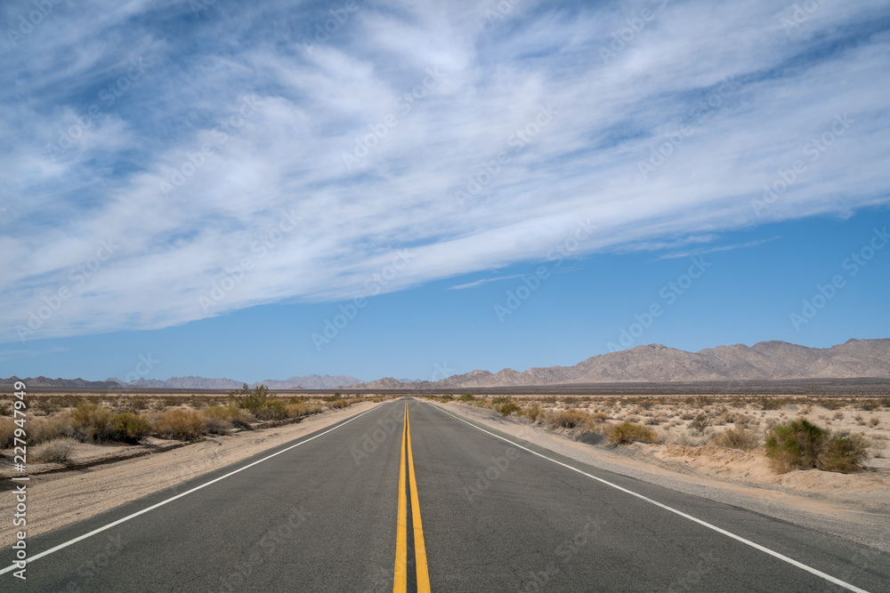 Empty Desert Highway running from California to Arizona Empty Desert Highway running from California to Arizona