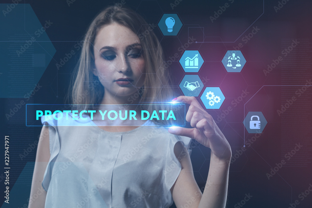 Fototapeta premium The concept of business, technology, the Internet and the network. A young entrepreneur working on a virtual screen of the future and sees the inscription: Protect your data