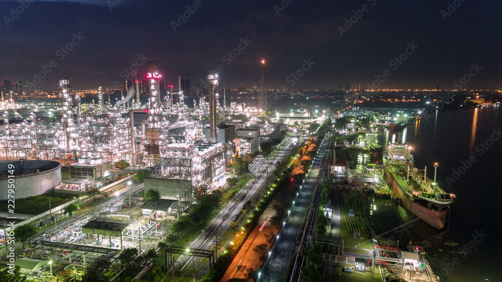 Oil refinery factory for energy or gas industry background.