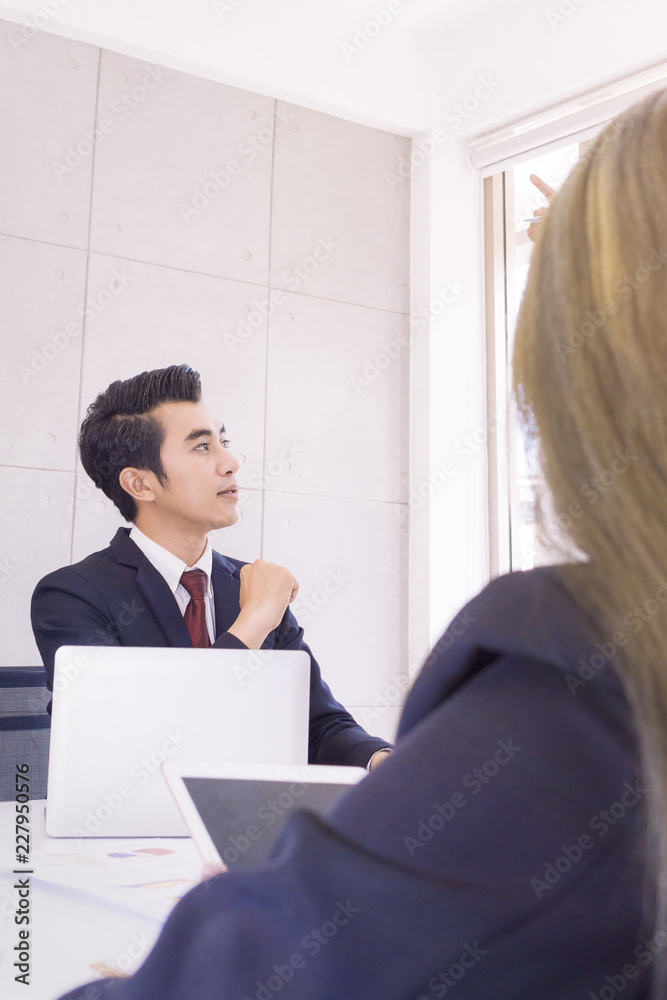 Young business man thinking and meeting at office.Team present project .Copy space. Young business man thinking and meeting at office.Team present project .Copy space.