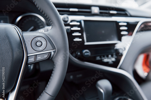 View of the interior of a modern automobile showing the dashboard © standret